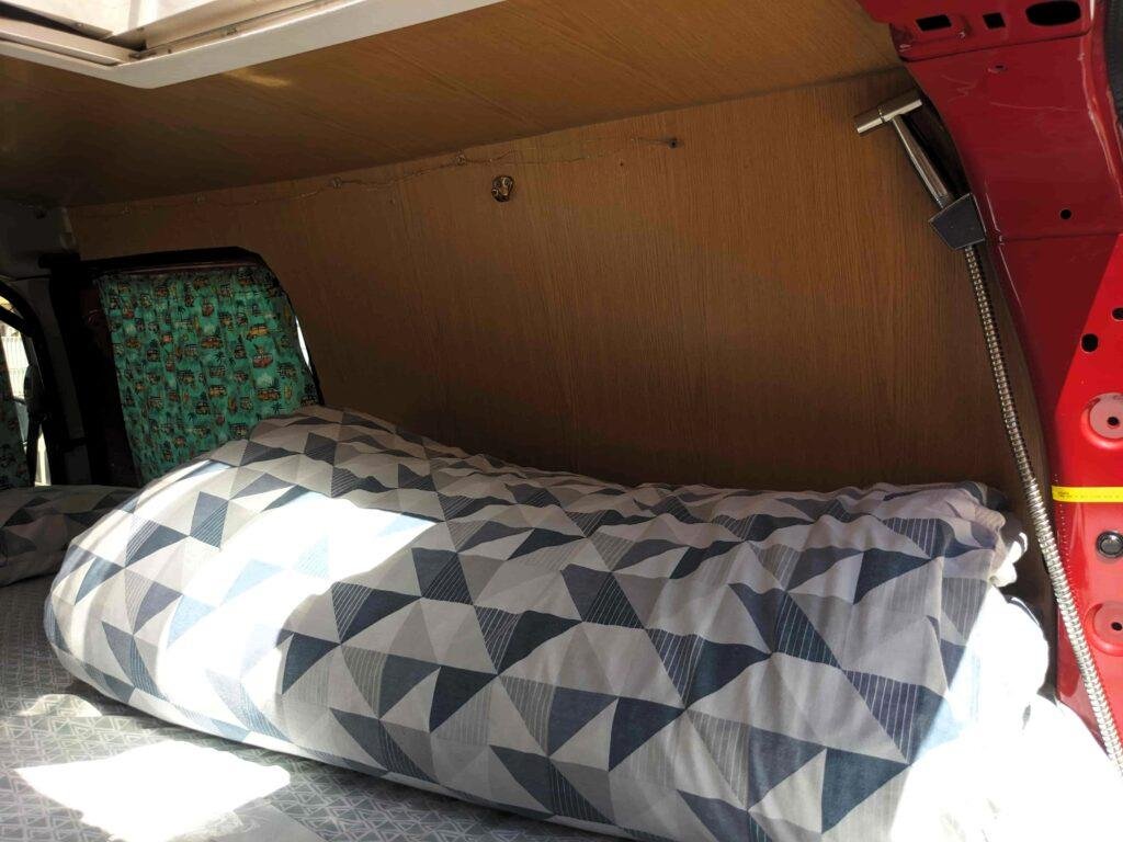 Double bed inside the Renault Kangoo Maxi XXL mini campervan